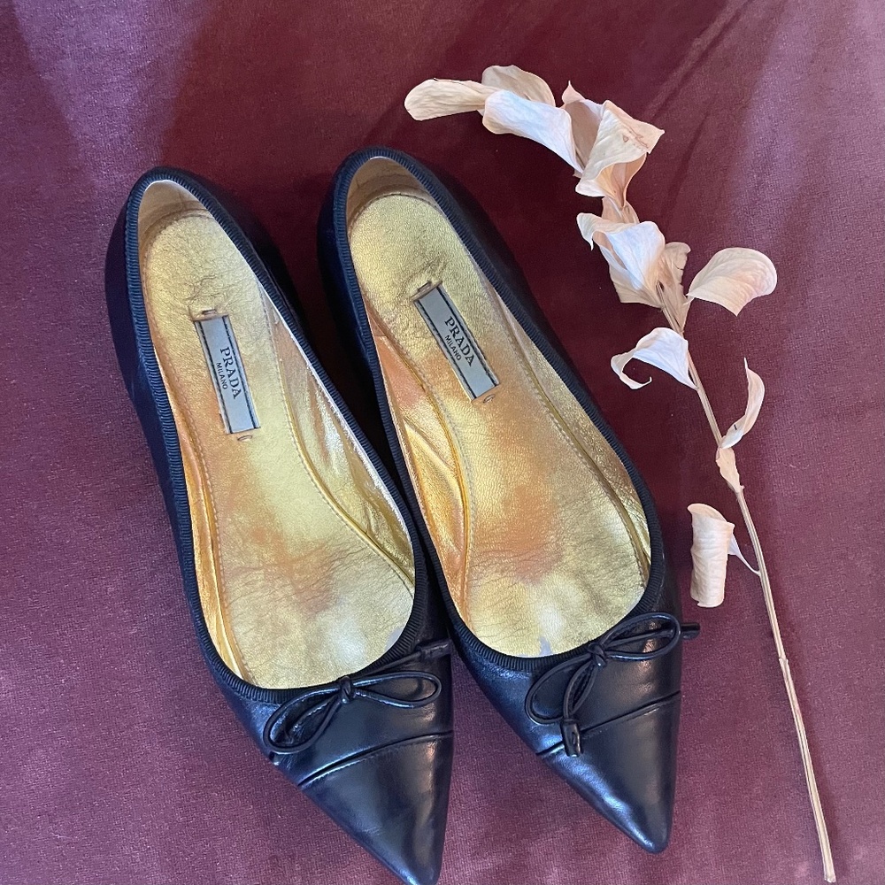 Prada pointed black leather bow flats